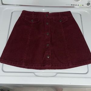 BDG burgundy button down mini skirt. Size S.